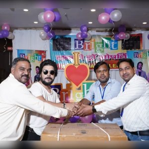 Joint Handshake over Bumper Prize Box