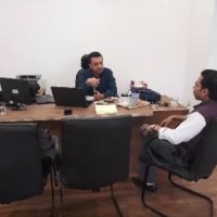 Business Meeting with Client at Office